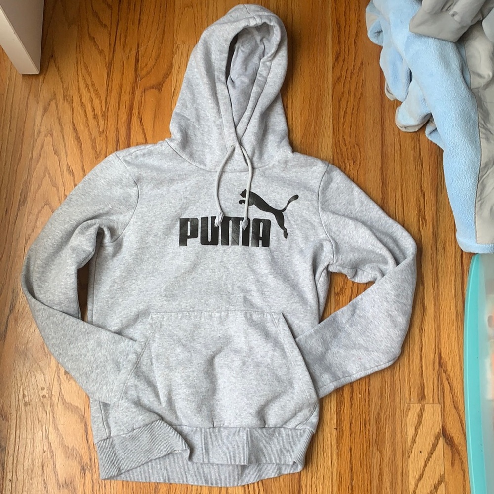 A grey puma sweatshirt